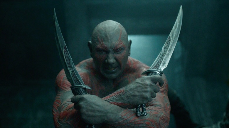 Drax holding knives