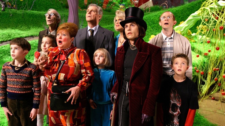 Willy Wonka and guests in factory