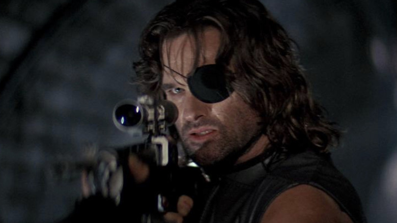 Snake Plissken aims gun