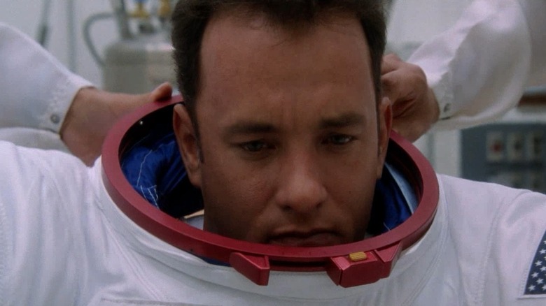 Tom Hanks looking down