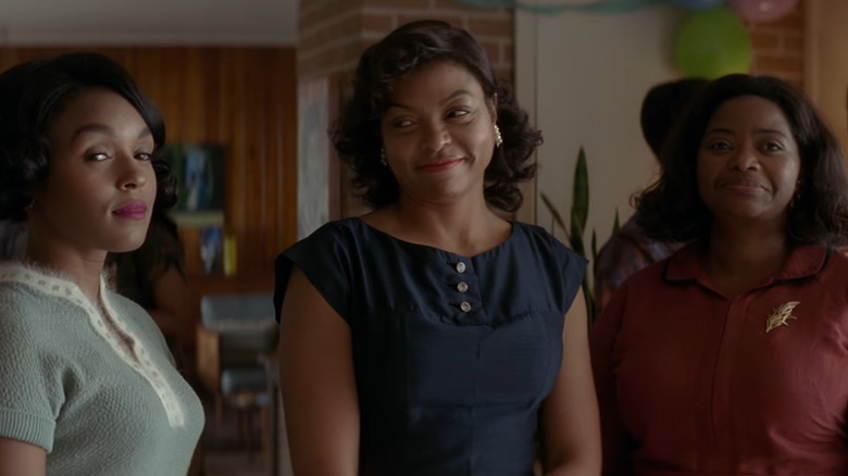 Janelle Monae, Taraji P. Henson, and Octavia Spencer smiling