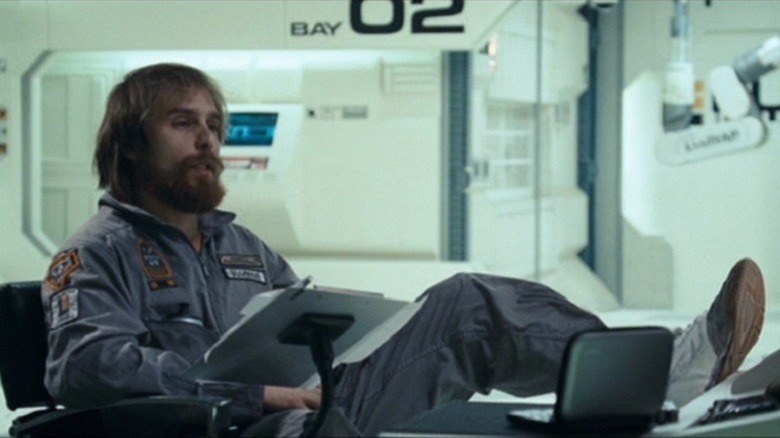 Sam Rockwell sitting