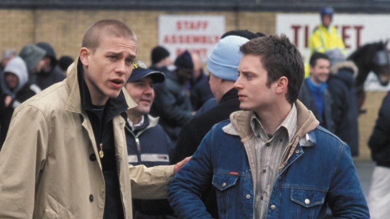 Elijah Wood and Charlie Hunnam at a soccer match