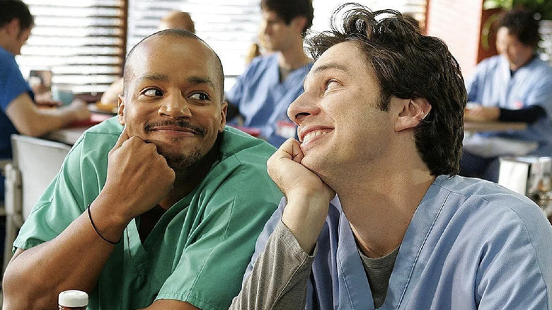 Dr. Turk and J.D. smile at each other in "Scrubs"