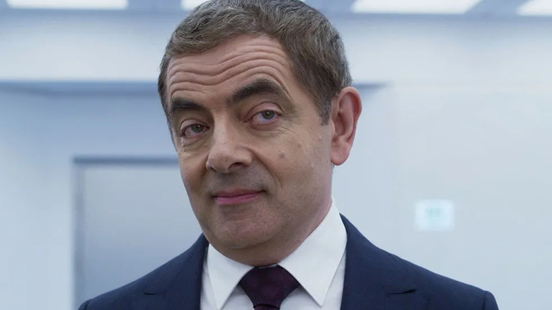 Rowan Atkinson slyly smiles