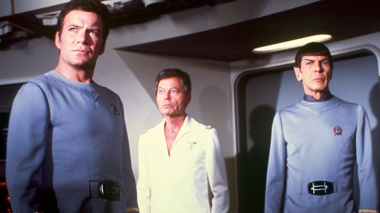 Kirk, Spock, McCoy on the bridge