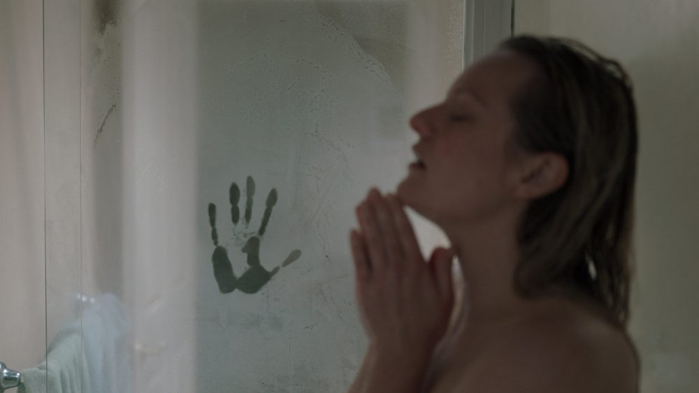 Elisabeth Moss in The Invisible Man, shower scene with handprint