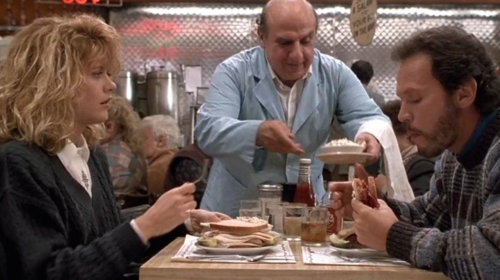 Meg Ryan and Billy Crystal eat at a diner