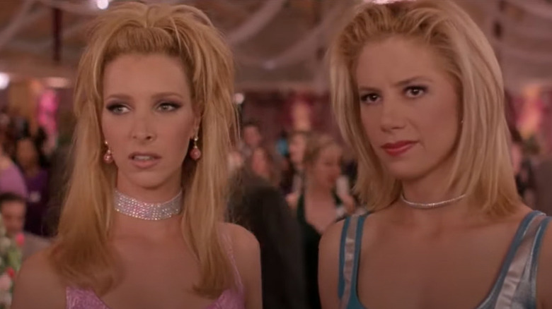 Romy and Michele look on
