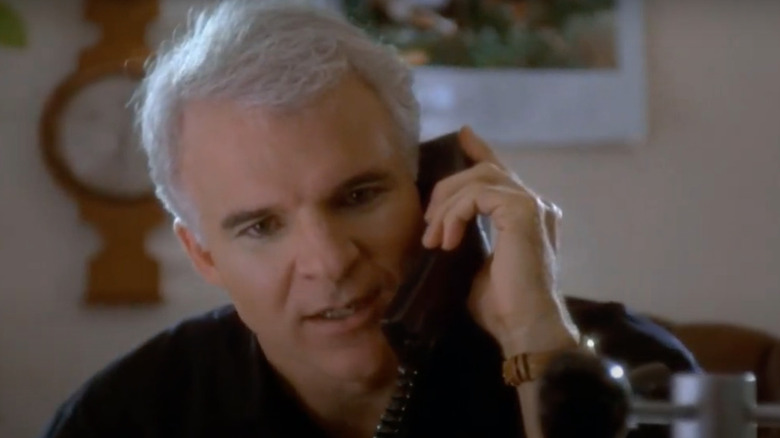 Steve Martin speaks on the phone.