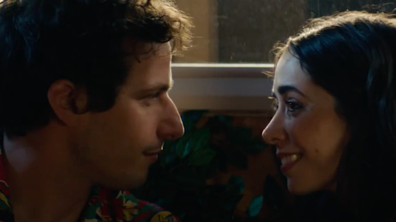 Andy Samberg stares at Cristin Milioti.