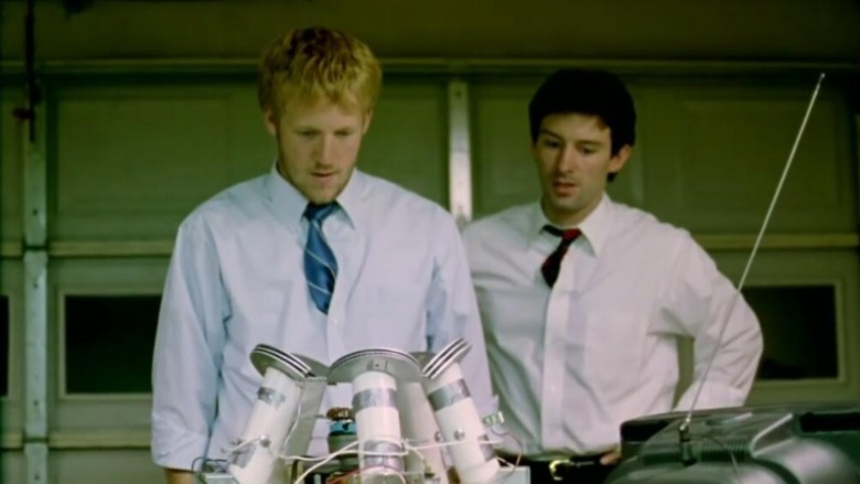 Aaron and Abe examine machine