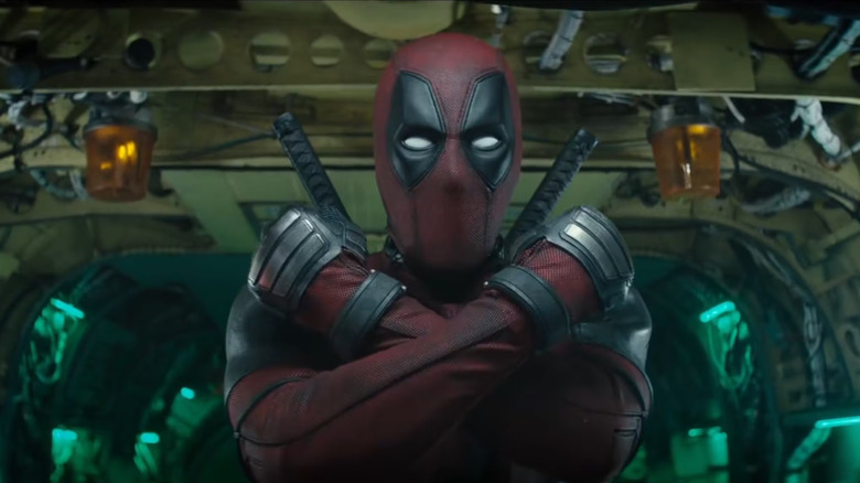 Deadpool forming the X of X-Force