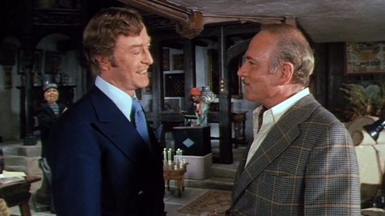 Michael Caine and Laurence Olivier face off.