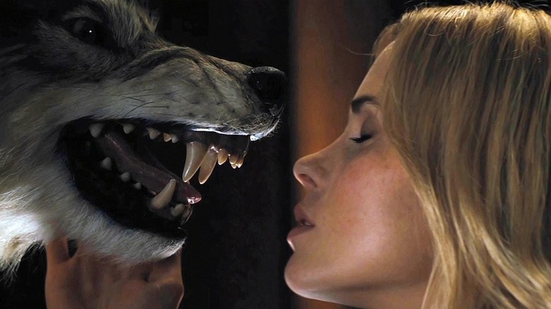 Jules is dared to make out with a wolf head