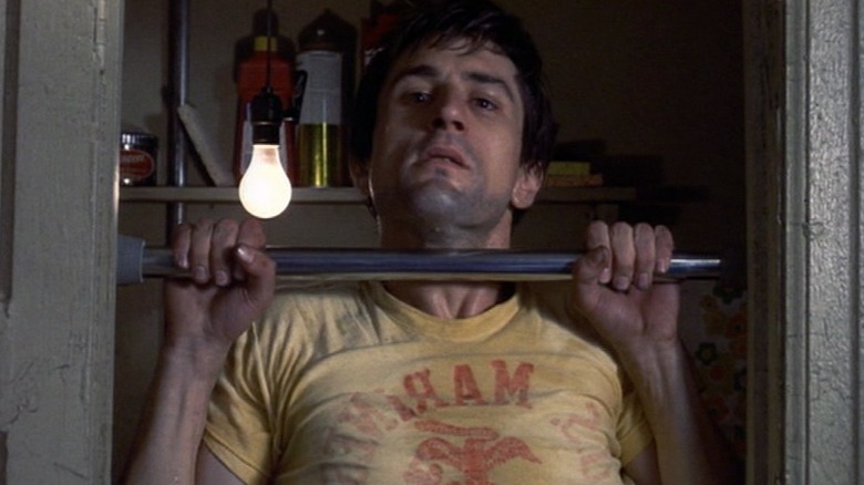 Travis Bickle doing pull-up