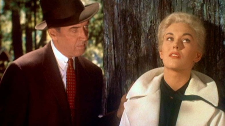 Jimmy Stewart and Kim Novak in a forest