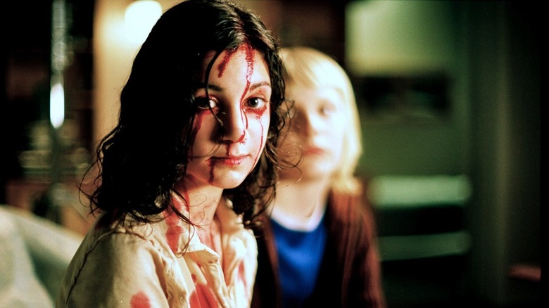 Eli and Oskar in Let The Right One In.