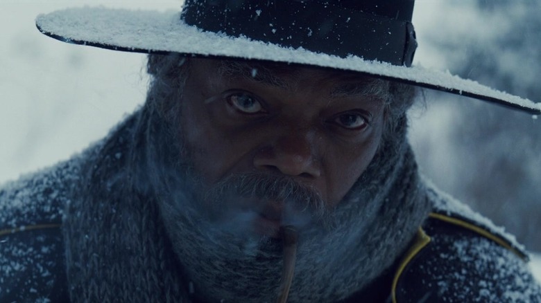 Marquis smoking cigar in snow