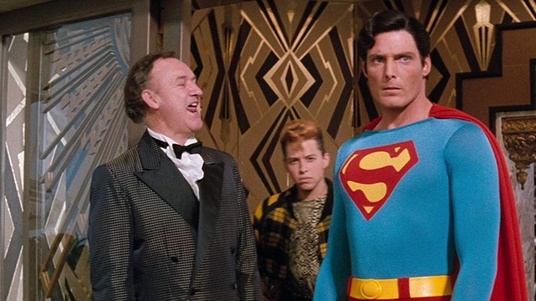 Gene Hackman as Lex Luthor, Jon Cryer as Lenny Luthor, and Christopher Reeve as Superman in "Superman IV: The Quest for Peace"