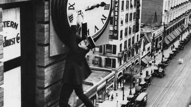 Harold Lloyd hanging from clock