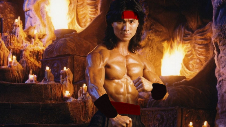 Liu Kang posing in front of fire