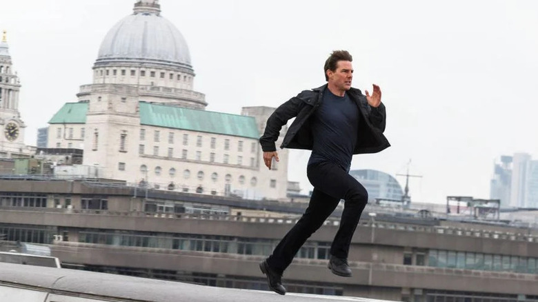 Ethan Hunt running across rooftop