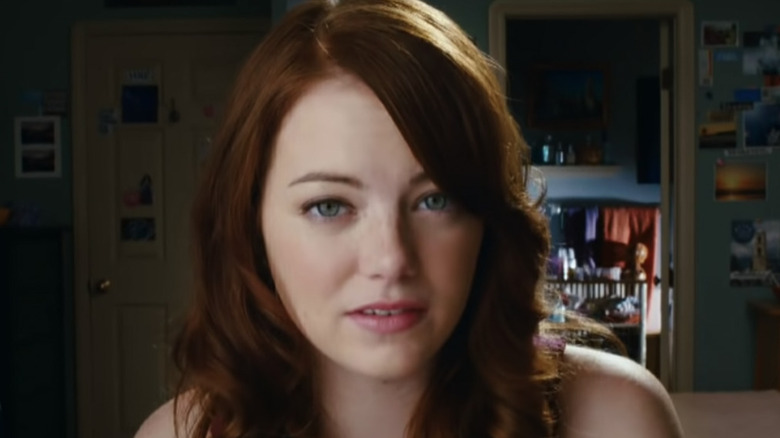 Emma Stone looks at camera