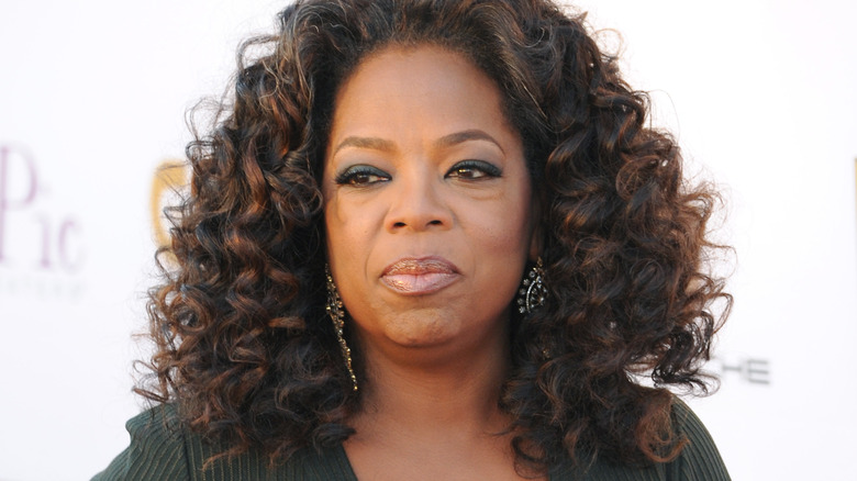 Oprah purses lips on red carpet