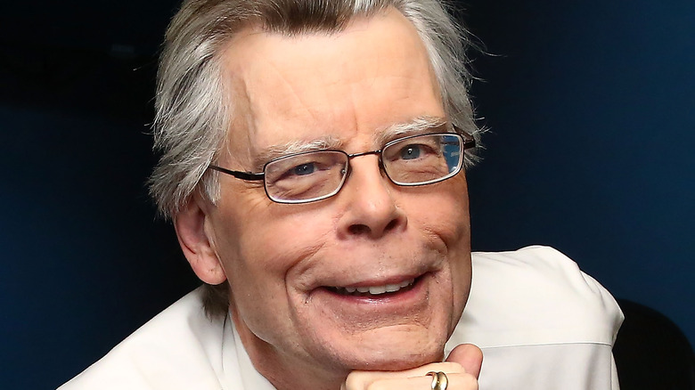 Stephen King covers his eyes