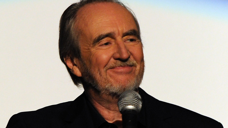 Wes Craven smiles at podium