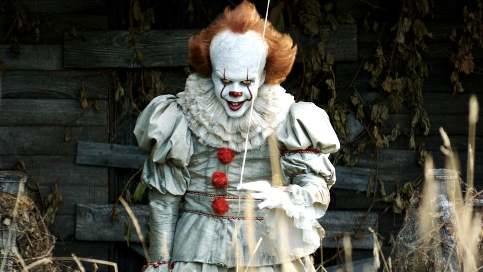 Movie review: Fear wears a creepy clown face in 'It