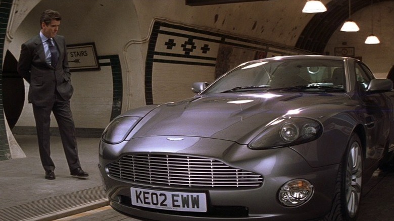 Pierce Brosnan looks at Aston Martin