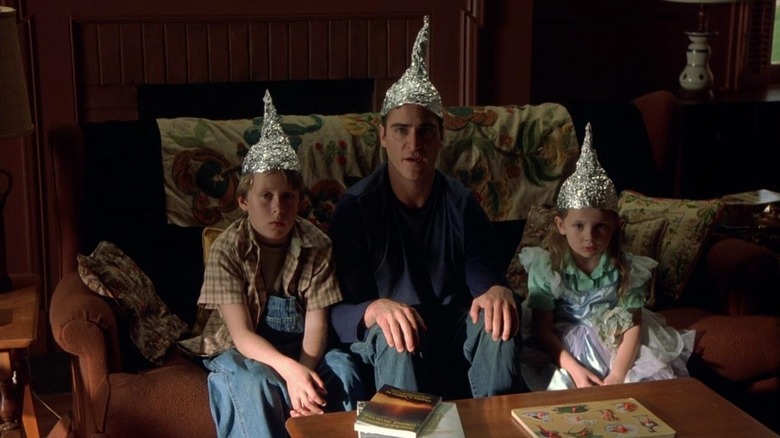 Joaquin Phoenix and kids wear aluminum foil 