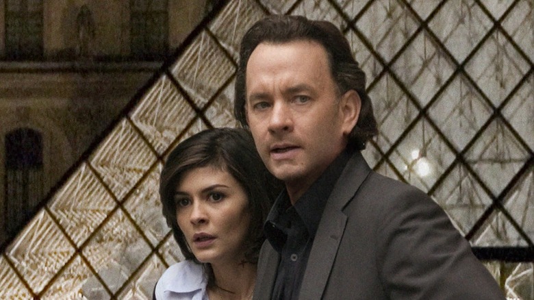 Robert Langdon and Sophie Neveu react