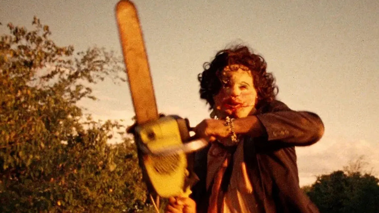 Leatherface holds a chain saw