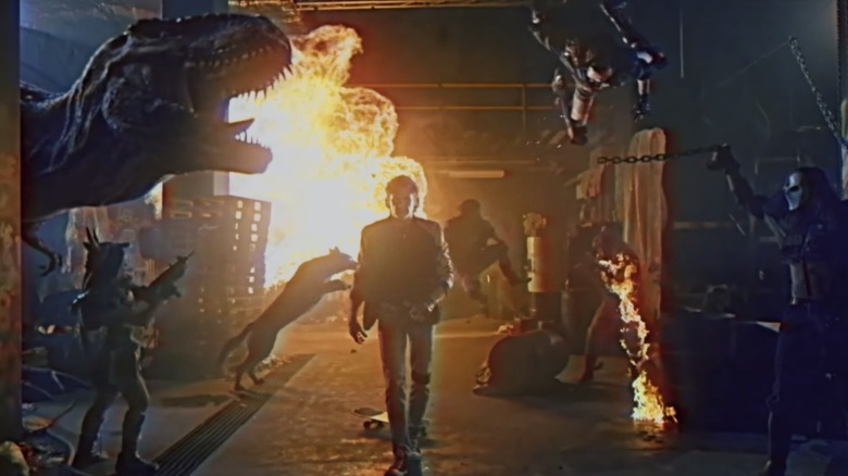 Kung Fury walks through gunmen and dinosaurs in "Kung Fury 2"