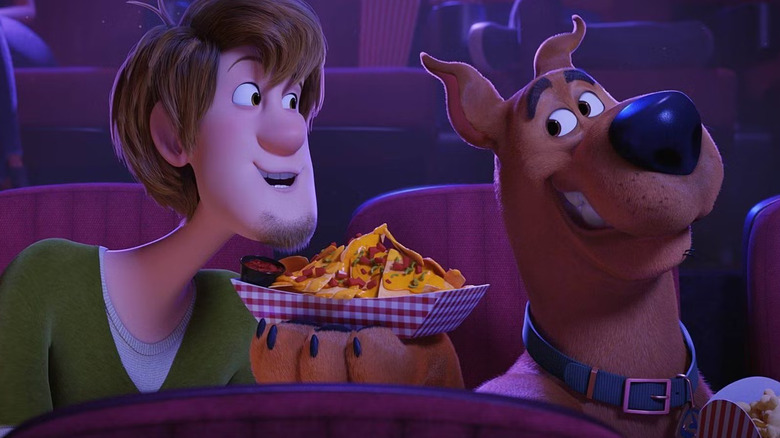 Shaggy and Scooby share nachos in "Scoob!" (2020)