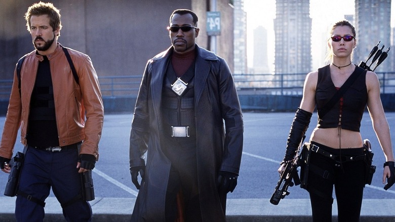 Ryan Reynolds, Wesley Snipes, and Jessica Biel walk on roof