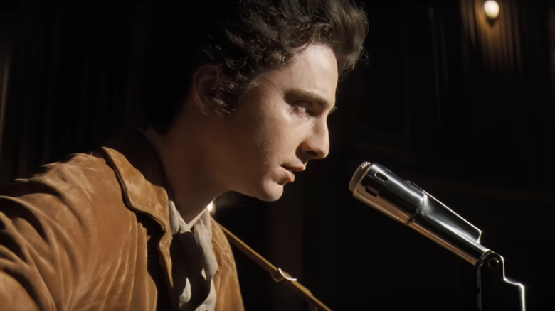 Timothee Chalamet singing as Bob Dylan