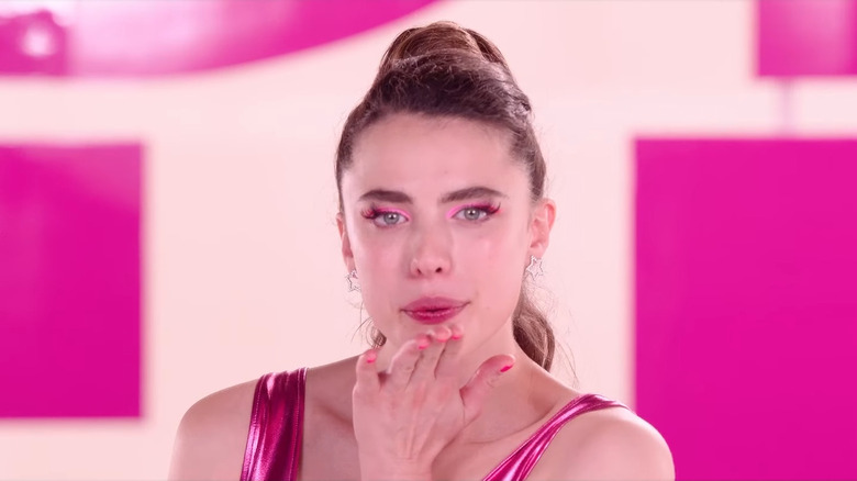 Margaret Qualley blowing kiss