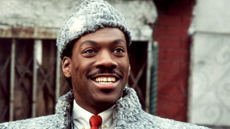 Prince Akeem smiles broadly