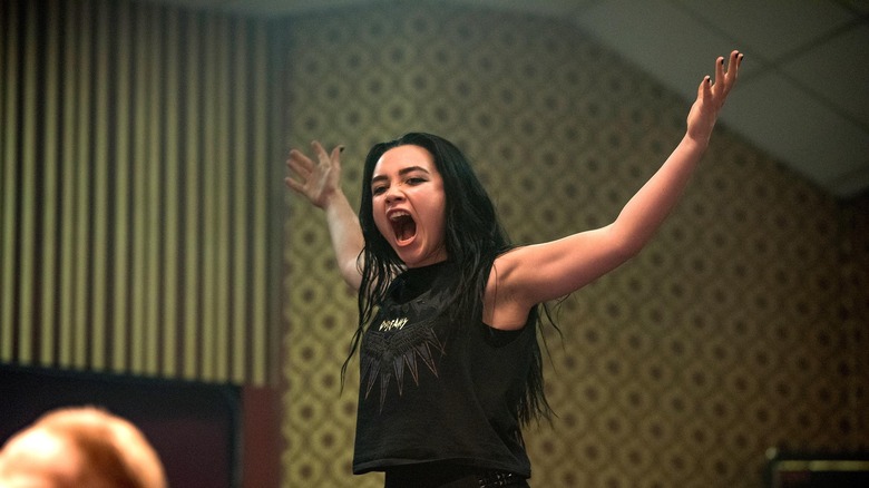 Florence Pugh as wrestler Paige