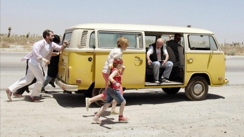 Hoover family running to yellow van