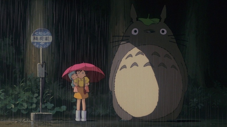 Satsuki, Mei, and Totoro at bus stop