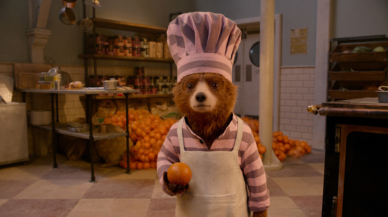 Paddington holding orange in prison