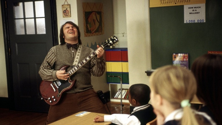 Dewey Finn playing guitar