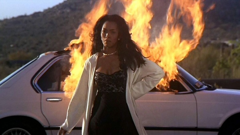 Angela Bassett and burning car