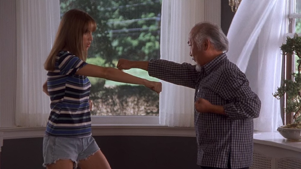 Hilary Swank and Pat Morita practicing karate in The Next Karate Kid