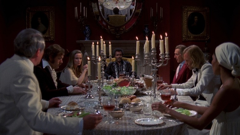 Guests gathered at a dinner table